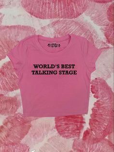 "Crop top with \"Worlds Best Talking Stage\" - design printed on a 95% cotton 5% spandex, form fitting, available in multiple colors 💞 Make sure to check the size chart!✨ Message me with any questions :)  we do not give refunds for incorrect addresses so please double check that all your information is correct before ordering" Pink Text Print Cropped T-shirt With Crew Neck, Trendy Stretch T-shirt With Slogan, Y2k Style Crop Top T-shirt With Text Print, Fitted Pink Cropped T-shirt With Graphic Print, 90s Slogan Cotton T-shirt, Pink Y2k T-shirt With Letter Print, Trendy Pink Cropped T-shirt With Letter Print, Fitted 90s Style Crop Top T-shirt, Pink Stretch T-shirt With Text Print