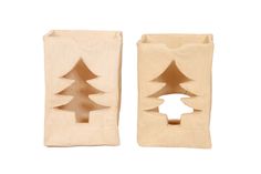 two clay christmas trees sitting next to each other