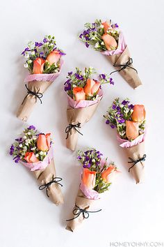 flowers are wrapped in brown paper and tied with black string on the left side of the page