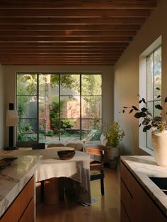 the kitchen is clean and ready to be used as a living room or dining area