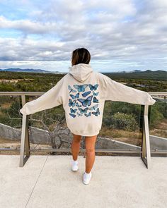 Trendy Hoodie with blue butterflies on the back. Cute Vintage Aesthetic Butterfly Hoodie for Fall. This hoodie can be great gift for your friends and family.  Production time: 1 to 3 days Shipping time: 2 to 5 days ☀️ Product Details Unisex heavy blend Hoodie 50% cotton, 50% polyester (fiber content may vary for different colors) Medium-heavy fabric (8.0 oz/yd² (271 g/m Classic fit Runs true to size ☀️ Sizing Please see size guide in listing photos for measurements and information. Please check Cowgirl Bachelorette, Aesthetic Hoodie, Mom Hoodies, Country Concert Outfit, Cowgirl Shirts, Moms Club, Fall Hoodies, Cowgirl Outfits, Sweatshirts And Hoodies