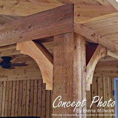 an image of a wooden structure that is in the middle of a room with wood paneling