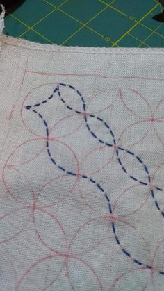 a close up of a piece of cloth with stitching on it