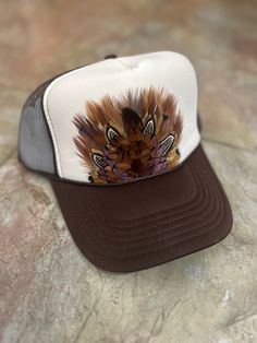 Bird Ridge hats are individually crafted to ensure that no two are ever the same, uniquely made, just like you! White Cap For Western-themed Events, Brown Mini Hats With Flat Brim For Country Events, Western Style Brown Mini Hat, Brown Western Mini Hat, Brown Flat Brim Mini Hat For Country Events, Adjustable Country Hats With Feather Trim, Adjustable Mini Hat With Feathers For Kentucky Derby, Adjustable Feathered Top Hat For Kentucky Derby, Adjustable Hats With Feather Trim For Western-themed Events