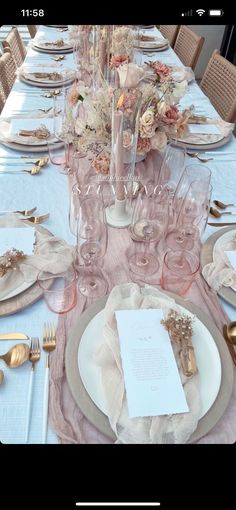 the table is set with plates, silverware and napkins for dinner guests to enjoy