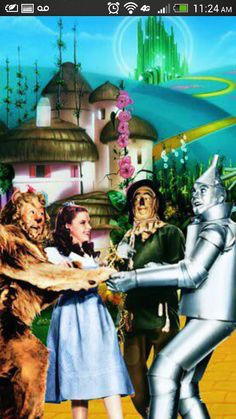 an image of wizard and wizard cat dancing in front of the castle with other characters