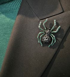 Here at TieTownCo, we make sure our formal wear accessories complement your formal wear of choice!  Presenting our luxury brooch pin collection. Stand out  and steal the spotlight as you sport gold and silver plated alloys fashioned into a whimsical motif.  Sharp, playful and luxurious--our brooch pins add that dash of dapper to any ensemble.  Perfect as gifts too! Green Spider, Man Hunter, Men's Brooch, Gold Lion, Crystal Flower, Green Crystals, Flower Brooch, Blue Crystals, Pin Collection