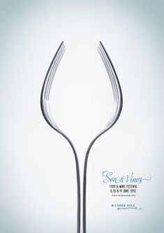 an advertisement for sea and wings featuring two forks in the shape of a heart on a light blue background