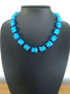 "Superb electric blue glass beads, better in real life than photos can do justice to. Each bead is 1.5 cm square, paler blue opaque swirls inside clear blue glass, with small royal blue cube and tiny silver tone glass spacers between for additional interest.   The overall length of the necklace is 19.5\", and sits at the collarbone, drawing the eyes upwards to the face and looking particularly good against or above neutral colours. The earrings are made from matching glass beads with a 4cm drop, Collarbone Drawing, Golden Tigers, Natural Gemstone Necklace, Chevron Necklace, Tigers Eye Necklace, Black Onyx Necklace, Blue Goldstone, Neutral Colours, Jasper Necklace