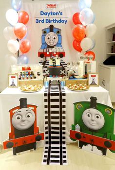 thomas the tank engine birthday party decoration with balloons and streamers for kids's birthday