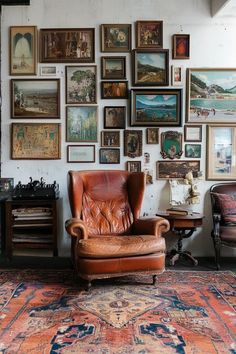 an old chair is sitting in front of a wall full of pictures and other items