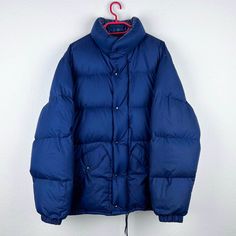 🚨 follow us on instagram @bestclassicvintage 🚨 Beautiful vintage Moncler Down Jacket from the 90s. Very thick and warm, perfect for the winter. Like new condition, which is extremely rare for these jackets.. 100% authentic. Size fits like men's L-XL Armpit to armpit 65 cm Back length without collar 77 cm Classic Puffer Outerwear For Winter, Classic Winter Puffer Outerwear, Classic Winter Outerwear For Streetwear, Vintage Oversized Outerwear For Outdoor, Classic Long Sleeve Puffer Jacket For Outdoor, Vintage Oversized Outerwear For Winter, Oversized Vintage Outerwear For Winter, Oversized Vintage Outerwear For Cold Weather, Vintage Solid Color Outdoor Outerwear