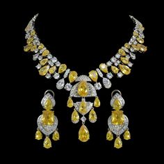 Yellow Diamond Necklace featuring semi precious canary yellow stones and cz diamond. Ideal jewelry to pair with your bridal wedding gown and prom gown. This Victorian Style LUXURY necklace will surely elevate your look. Perfect gift for Her. *𝐏𝐑𝐎𝐃𝐔𝐂𝐓 𝐃𝐄𝐓𝐀𝐈𝐋* * 𝐌𝐚𝐭𝐞𝐫𝐢𝐚𝐥: Brass * 𝐏𝐥𝐚𝐭𝐢𝐧𝐠: White Rhodium Plated * 𝐒𝐭𝐨𝐧𝐞: AAA-quality CZ Diamond & Canary. *𝐃𝐈𝐌𝐄𝐍𝐒𝐈𝐎𝐍𝐒* *𝐍𝐞𝐜𝐤𝐥𝐚𝐜𝐞* * 𝐖𝐞𝐢𝐠𝐡𝐭: 114 gm * 𝐃𝐫𝐨𝐩 𝐋𝐞𝐧𝐠𝐭𝐡: 7.5 Inches * 𝐖𝐢𝐝𝐭𝐡: 2 Yellow Sapphire Necklace, Canary Yellow Diamonds, Yellow Diamond Necklace, Yellow Diamond Earring, Canary Diamond, Jewelry Sets Handmade, Neck Pieces Jewelry, Yellow Necklace, Fancy Yellow Diamond