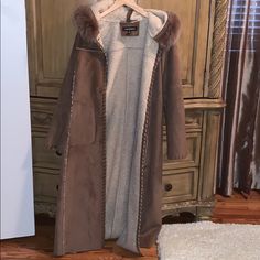 Long Fuzzy Coat Never Worn Long Brown Outerwear For Cold Weather, Long Fall Outerwear With Faux Fur Lining, Long Outerwear With Faux Fur Trim For Fall, Long Fuzzy Coat, Fuzzy Coat, Trench Coats, Long Coat, Trench Coat, Jackets & Coats