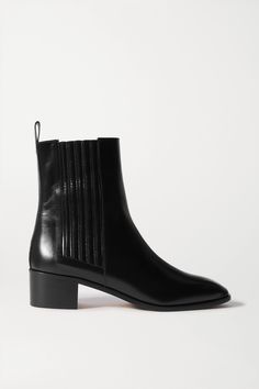 aeyde's shoes are expertly crafted in the label's family-owned factories in Italy - the red hand-sewn stitch found on each pair is a nod to the brand's commitment to quality. A modern iteration of classic Chelsea styles, these 'Neil' boots are sculpted from glossy black leather in a slender silhouette that works well with everything from jeans to midi skirts.Shown here with: [Alexander Wang Coat id1202022], [Goldsign Jeans id1155920], [LOULOU STUDIO Bodysuit id1179643], [Kassl Editions Tote ... Chelsea Boots Men Outfit, Boots Men Outfit, Shoes Boots Ankle, Chelsea Boots Men, Black Chelsea Boots, Leather Chelsea Boots, Boot Brands, Midi Skirts, Chelsea Boot