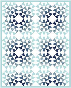 a blue and white quilt with triangles in the middle, on a light blue background