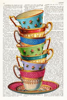 a stack of tea cups on top of each other in front of an old book page