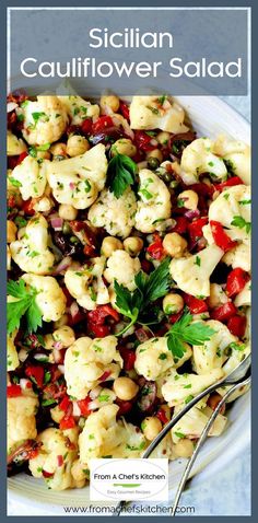 a white plate topped with cauliflower salad