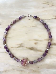 A necklace made of natural stone suitable for holidays and everyday wear, for office and concert, a gift for mom, sister, or a friend for their birthday, wedding day, Christmas, or Valentine's Day. A personalized meaningful gift based on the zodiac sign and moon phase. A Fluorite charm, 0.88 ounces in size, supports fluorite 6mm beads and hematite inlays. Steel hardware, lobster clasp. Lithotherapy. Lavender Handmade Necklace For Meditation, Handmade Lavender Necklace For Meditation, Adjustable Gemstone Necklaces, Polished Tumbled Bead Necklaces As Gifts, Tumbled Polished Bead Necklaces For Gifts, Handmade Tumbled Beaded Necklaces As Gifts, Handmade Tumbled Beaded Necklaces For Gifts, Tumbled Polished Beads Necklace For Gifts, Handmade Tumbled Beaded Necklace For Gifts