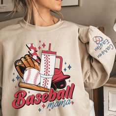 Elevate your softball mom style with our Bougie Retro Baseball Mom Sweatshirt, personalized with your kids' names elegantly printed on the sleeve. This unisex heavy blend crewneck sweatshirt is the epitome of comfort and style, making it perfect for any occasion. Crafted from a cozy blend of polyester and cotton, this sweatshirt ensures your designs come out looking fresh and beautiful while providing exceptional comfort. The ribbed knit collar retains its shape wash after wash, ensuring a lasti Mama Crewneck, Baseball Mom Shirt, Retro Baseball, Baseball Mom Shirts, Softball Mom, Kids Names, Sweatshirt Cute, Mom Sweatshirt, Baseball Mom