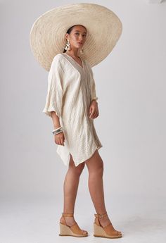 "🚚..ALL ORDERS ARE SHIPPED VIA DHL EXPRESS MAIL Float blissfully through the day in this comfortable relaxed kaftan dress. * Pullover style * V-neck front and back * Dropped shoulder; three-quarters sleeves * Brown stripe fabric front and back panels * Side slits * Unlined * Prewashed, Preshrunk Measurements approximately: Sleeve Length (from side of neckline): 23\" (58 cm) Armhole: 24\" (61 cm)-round Sleeve cuff: 20\" (51 cm)-round Bust: 50\" (127 cm-all around) Hips: 50\" (127 cm-all around) Chic Cotton Beach Tunic, Beige Tunic Dress For Loungewear, Chic Split Neck Dress For Beach, Chic Split Neck Dress For The Beach, Summer Tunic With Relaxed Fit And Split Neck, Summer Split Neck Tunic With Relaxed Fit, Summer Tunic Kaftan For Daywear, Beach Dresses With Relaxed Fit And Split Neck, Summer Daywear Dress With Split Neck