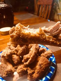 fried food on a blue and white plate