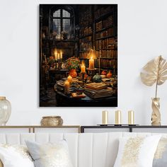 a room filled with lots of books and candles