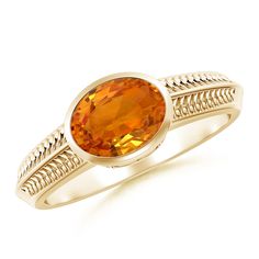 Secured in a bezel setting is an oval orange sapphire, placed horizontally on the shank. The ornate grooves on the shoulders and the scrollwork on the gallery infuse a touch of elegance to this exquisite 14k yellow gold solitaire ring. Orange Oval Sapphire Ring, Orange Oval Sapphire Gemstone Ring, Oval Orange Sapphire Ring, Formal Orange Oval Cabochon Ring, Orange Oval Jewelry With Center Stone, Classic Orange Oval Cabochon Rings, Oval Orange Jewelry With Center Stone, Orange Oval Center Stone Jewelry, Classic Orange Oval Jewelry