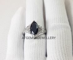 "Gemstone name = Natural Spinel Black Stone Shape = Marquise Stone = 6X12 MM Quality :- AAA Metal:- 925 Sterling silver Handmade Statement Ring STATEMENT RING FOR ALL OCCASION Don't miss this opportunity to own this beautiful Gemstone Ring Your order will be handmade and ready for shipment in 3 to 5 Business days. AFGEMSNJEWELLERY https://www.etsy.com/uk/shop/AFGEMSNJEWELLERY We are manufacture, supply, wholesale and export \"Best Quality Product At Best Price\". Payment Accepted We Accept Payme Black Marquise Ring As Gift, Black Marquise Ring Gift, Black Marquise Ring For Gift, Onyx Ring Engagement, Garnet Ring Vintage, Black Spinel Ring, Marquise Cut Engagement Ring, Onyx Engagement Ring, Garnet Engagement Ring