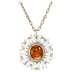 Exceptional 24.14 Carat Madeira Citrine Cabochon Convertible Pendant Necklace & Brooch – A Rare Masterpiece Tamir by Merkaba Jewelry Beverly Hills. Discover the Beauty of Versatility and Elegance Celebrate the extraordinary with this rare 24.14-carat Madeira Citrine cabochon, a one-of-a-kind piece that combines elegance and versatility. Set in an intricate convertible design of 18K yellow and white gold, this masterpiece transitions seamlessly between a pendant necklace and a brooch. Adorned wit Luxury Engagement Rings, Genie Bottle, Yellow Diamond Rings, Citrine Pendant, Diamond Gift, Cabochon Pendant, Yellow Gold Chain, Romantic Gifts, Yellow Diamond