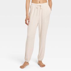 Stay comfy in classic style as you hang with friends or lounge around the house wearing these Cozy Ribbed Wide-Leg Pants from Auden™. Made from lightweight, super-cozy soft-brushed rib fabric with spandex, these jogger pants feature a full elastic waistband with a drawstring to help you find a snug, stay-put fit. Cut to an ankle length, they're designed with tapered legs and also feature side pockets for easy stashing of small items. Auden™: Comfort true to every shape & hue. Cute Lounge, Hanging With Friends, Rib Fabric, Fleece Joggers, Womens Fleece, Bottom Clothes, Pull On Pants, Straight Pants, Lounge Pants