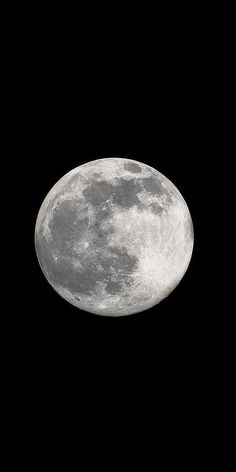 an airplane flying in the sky over the moon