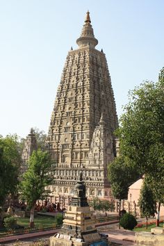 a large stone structure sitting in the middle of a park