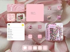 the pink flowers are arranged on the computer screen