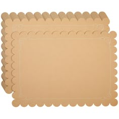 three pieces of cardboard with scalloped edges