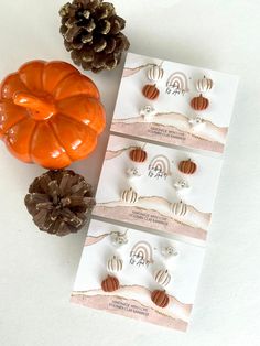 Micro stud pack. 1 ghost 1 pumpkin in white and one in orange. .50 inch. Super cute and tiny statement stud. Orange Earrings For Fall Season Gift, Fall Orange Earrings As Gift, Studded Pumpkin, Clay Designs, Earrings Fall, Earrings Clay, Pumpkin Earrings, Tiny Studs, Fall Earrings