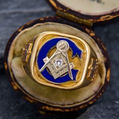 This vintage mens Masonic ring features a square and compass in white gold with a diamond accent at its center. The ring also features blue enamel and engraved shoulders. It is crafted in 10k yellow and rose gold and is currently a size 9.75. Antique Engagement Rings Sapphire, K Ring, Estate Jewelry Rings, Wedding Ring Diamond Band, Masonic Ring, Antique Engagement Rings, Mens Ring, European Cut Diamonds, Sapphire Engagement