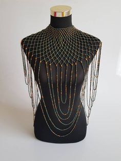 "This shoulder necklace is 100% handmade. Perfect for weddings , African themed events, cultural events or any other event. The list is endless.... Size; 22\" long for the longest strand. 16\" around the neck. **Buy multiple items and pay shipping for 1 item only.The rest ships free. More neckleces here; https://www.etsy.com/shop/TribalTess?ref=seller-platform-mcnav&section_id=21306083 Back to my shop; https://www.etsy.com/shop/TribalTess?ref=seller-platform-mcnav" Bohemian Beaded Bib Necklace For Wedding, Handmade Bohemian Bridal Necklace For Party, Bohemian Beaded Bridal Necklace For Wedding, Bohemian Beaded Bridal Necklace, Elegant Beaded Necklaces With Dangling Beads For Festivals, Handmade Bohemian Body Jewelry For Wedding, Elegant Handmade Body Jewelry For Festival, Unique Beaded Necklaces With Dangling Beads For Party, Elegant Dangling Beads For Festival