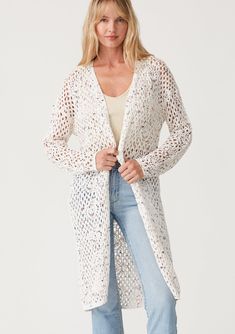 A vintage-inspired crochet knit cardigan in an ivory speckled knit. Crochet cardigan Speckled knit Relaxed fit Long sleeve Drop shoulder Mid-length Open front Vintage-inspired Lightweight bohemian cardigan Our best-selling crochet cardigan is back in a chic speckled knit. With long sleeves, a versatile mid-length, and an open front. The perfect light layer for the beach or running errands, we love to layer it over jeans and a simple tank top. Model is 5'9, wearing a size S.Style: I-51015K-SPA Cream Pointelle Knit Spring Cardigan, Spring Open Knit Cardigan, Spring Crochet Open Front Cardigan, Spring Cozy Pointelle Knit Cardigan, Cozy Spring Pointelle Knit Cardigan, Spring Open Knit Long Cardigan, Spring Long Open Knit Cardigan, Spring Crochet Sweater For Layering, Spring Cream Open Knit Outerwear