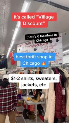 a man standing in front of a clothing rack