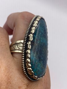 Large genuine blue Turquoise Vintage ring Low content silver not sterling. hand made repose on both sides. Huge stone over an inch long Can be adjusted 5-9 All rings are shipped free in the US in a nice gift box. Check out our over a THOUSAND great reviews!!! Engraving is $4 per letter and is not always perfect depending on the piece. It can take a few days if the jeweler is busy. This is payable to Paypal Judithsltd@gmail.com Artisan One Of A Kind Turquoise Ring, Artisan One-of-a-kind Blue Turquoise Ring, Unique Blue Turquoise Ring, Southwestern Blue Jewelry With Large Stone, Southwestern Style Blue Jewelry With Large Stone, Adjustable Untreated Blue Turquoise Ring, One Of A Kind Blue Turquoise Ring, Southwestern Blue Large Stone Jewelry, One-of-a-kind Blue Turquoise Ring