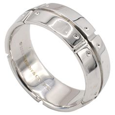 Tiffany & Co. Streamerica 18 Karat White Gold Band Ring Metal: 18k white gold Weight: 12.4 grams Width: 8mm Size: 10.5 (US) Signed: ©2002 Tiffany & Co. 750 Gold Band Ring, Tiffany And Co, Ring Metal, White Gold Band, Gold Band, Metal Rings, Gold Bands, Tiffany & Co., Band Ring