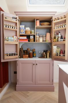 an open cabinet with many items in it