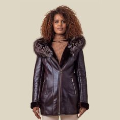 The Regan is one of Marco's most sophisticated designs yet. Bold quilted patterns, two inline zip pockets and a stunning tru-fur trimmed hood make The Regan ideal for the ultimate everyday wear. DETAILS & CARE td {border: 1px solid #ccc;}br {mso-data-placement:same-cell;} 'Croc' textured faux-leather jacket in rich brown, water-resistant 100% genuine fur trim hood High-quality hardware (YKK zippers) & materials Length of 30 inches (size M/L) Every Marco is hand-made. Professional dry cle Luxury Leather Jacket For Cold Weather, Luxury Outerwear With Faux Fur Trim For Cold Weather, Luxury Leather Jacket With Zip Fly For Winter, Luxury Faux Fur Trim Outerwear For Cold Weather, Luxury Hooded Outerwear With Faux Fur Lining, Luxury Mink Outerwear With Faux Fur Lining, Mink Colored Leather Fur Coat With Faux Fur Lining, Mink Leather Fur Coat With Faux Fur Lining, Luxury Sheepskin Leather Jacket With Faux Fur Lining