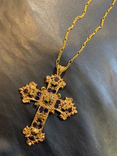 24k gold plated cross pendant with gold and purple crystals. Comes with an 18 inch chain. Gold Cross Jewelry With Large Pendant, Y2k Cross Necklace, Y2k Cross, Cross Necklace Gold, Men's Watch Accessories, Rosary Style Necklace, Gold And Purple, Dream List, Baddie Aesthetic