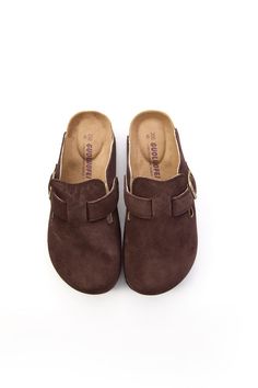 Step into style and comfort with the MAIBULUN Cruise Anywhere Suede Clog in dirt resistant chocolate. These versatile clogs are perfect for any occasion, from a relaxing weekend cruise to a busy day of errands. The soft suede material and slip-on design make them a must-have for any shoe collection. Go anywhere in style with these clogs. 0.78" Heel Slip-on / buckle closure Hard Cushioned footbed Suede 100% leather upper Leather lining EVA sole Slip-on Suede Clogs With Leather Sole, Suede Slip-on Clogs With Textured Sole, Brown Slip-on Clogs With Stitched Sole, Brown Slip-on Clogs With Removable Insole, Suede Slip-on Clogs With Buckle Closure, Suede Clogs, Relaxing Weekend, Reindeer Headband, Eva Sole