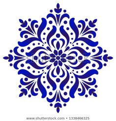 a blue and white snowflake on a white background