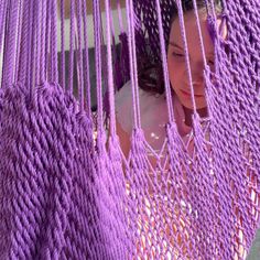 A happy girl is playing in a purple hammock swing with her dog. Indoor Hammock Netting, Crochet Net Hammock, Purple Hanging Chair, Pink Hammock, Indoor Jungle Gym, Sensory Swing, Hammock Green, Rope Chair, Child Therapy