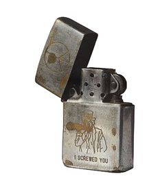 an old metal lighter with the words gone to you on it