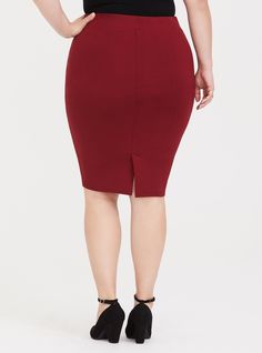 Thick ponte fabric stretches the way you need while smoothing you out and maintaining its shape. The wrinkle-free, no-fuss material lets you focus on the day ahead. Ponte fabric. Thick elasticized waist. Vented back. CONTENT + CARE: Rayon/nylon/spandex. Wash cold; line dry. Imported plus size skirt. SIZE + FIT: Model is 5'11, size 1. Size 2 measures 26” from waist to hem. The best plus size women's midi studio luxe ponte pencil skirt skirts in red made of studioponte. These dressy clothes and work-wear, office-wear, career-wear, and business-wear will make you look professional to nail your job interview and wear to work every day. Torrid is your destination for cozy fall and winter clothes to keep you warm and comfortable. Chic Red Stretch Pencil Skirt, Red Stretch Knee-length Pencil Skirt, Flattering Stretch Knee-length Bottoms, High Waist Stretch Pencil Skirt In Solid Color, Fitted Red Bottoms Mid-thigh Length, Red Fitted Bottoms Mid-thigh Length, High Waist Stretch Pencil Skirt Solid Color, Red Fitted Mid-thigh Length Bottoms, Stretch Knee-length Pencil Skirt In Solid Color